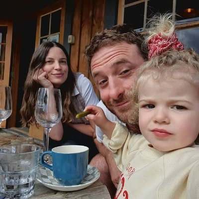 Dean posing for hsi Instagram feed by wearing white t-shirt.